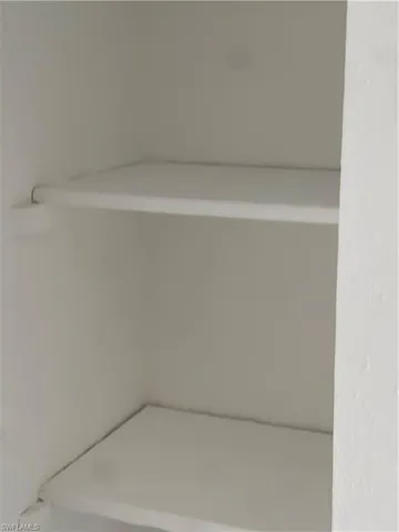 a view of a porch and garden