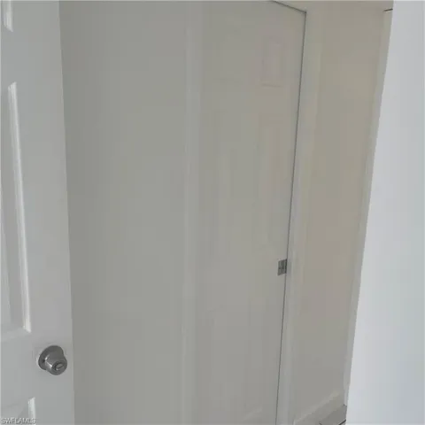 a view of a livingroom with wooden floor