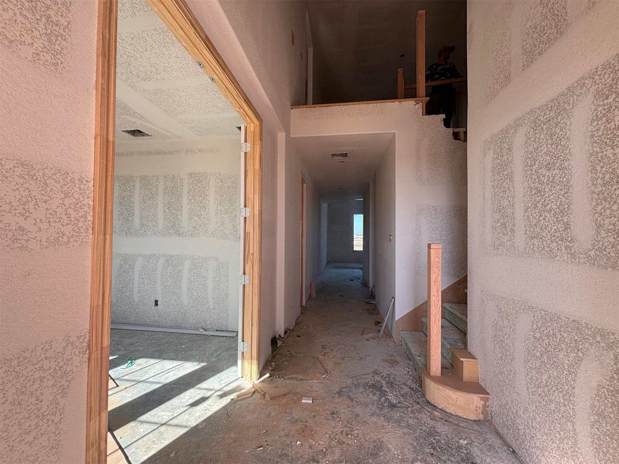 7826 Jasper Meadows Way Angleton, TX 77515 - Photo 26 of 34 a view of a hallway with wooden floor and entryway
