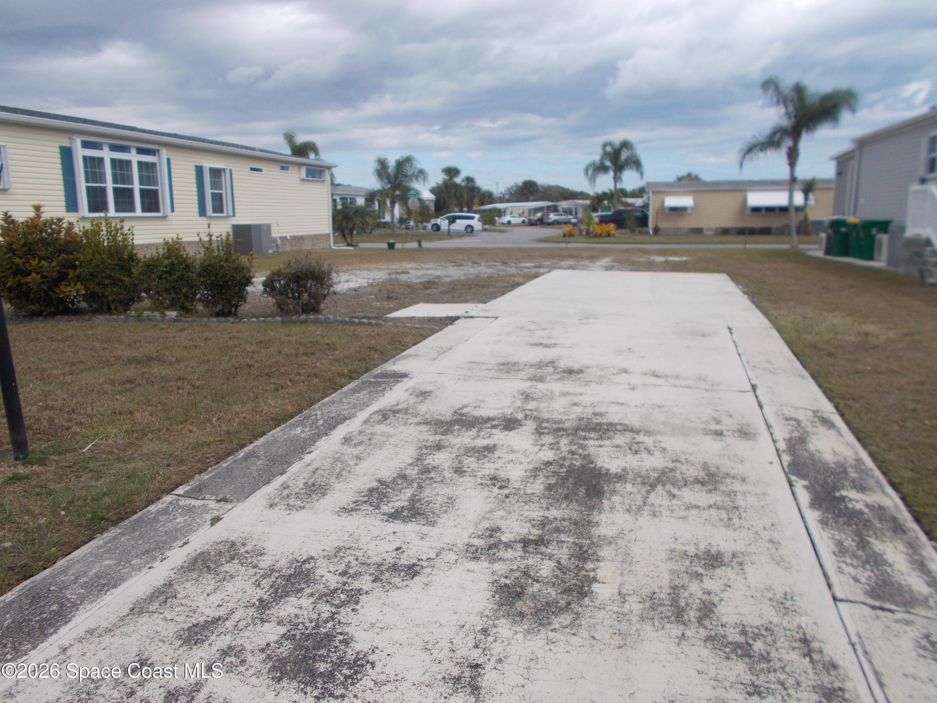 932 Fir Street Micco, FL 32976 - Photo 5 of 6 a view of a house with a yard