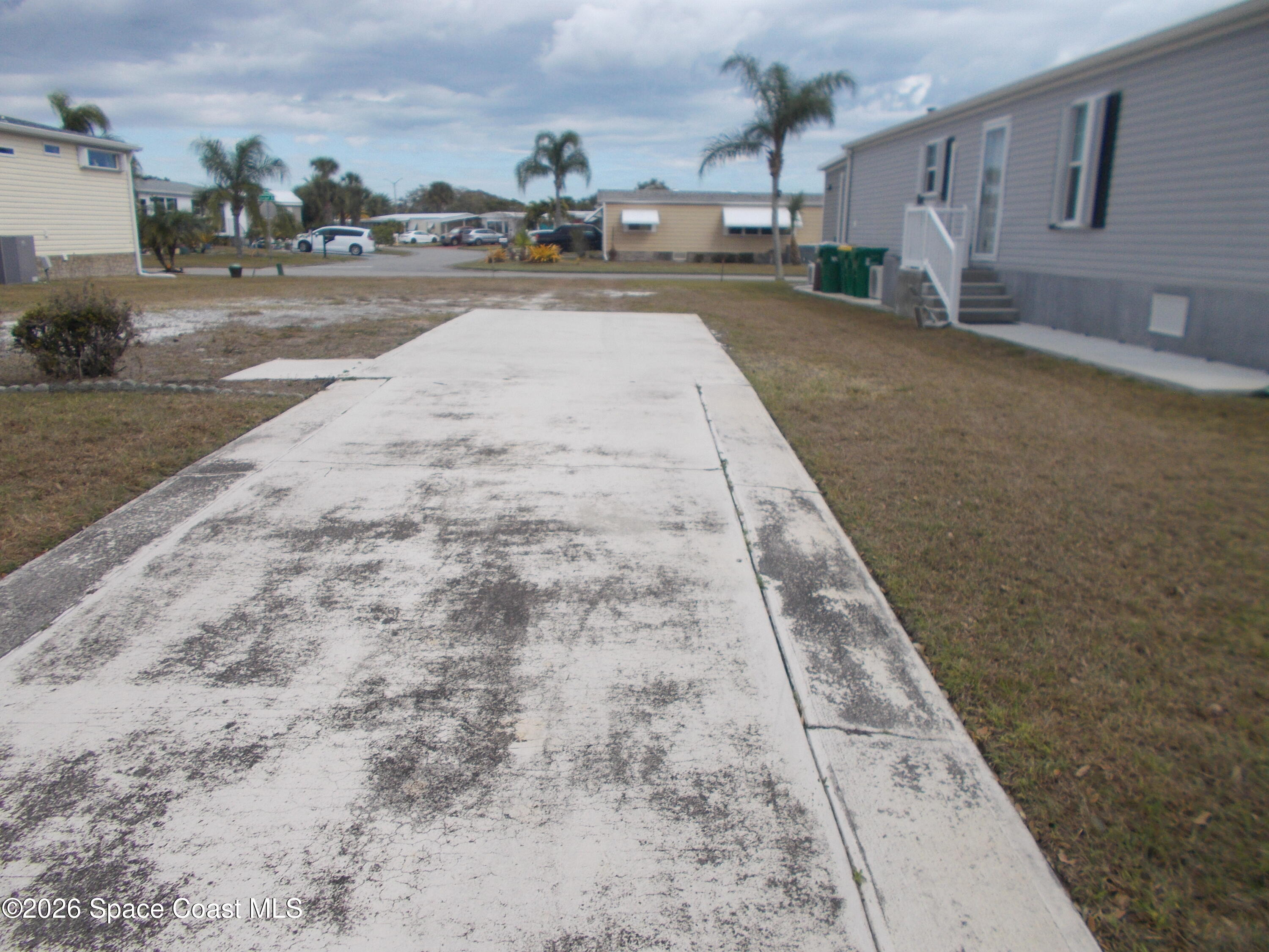 932 Fir Street Micco, FL 32976 - Photo 6 of 6 a view of street with view