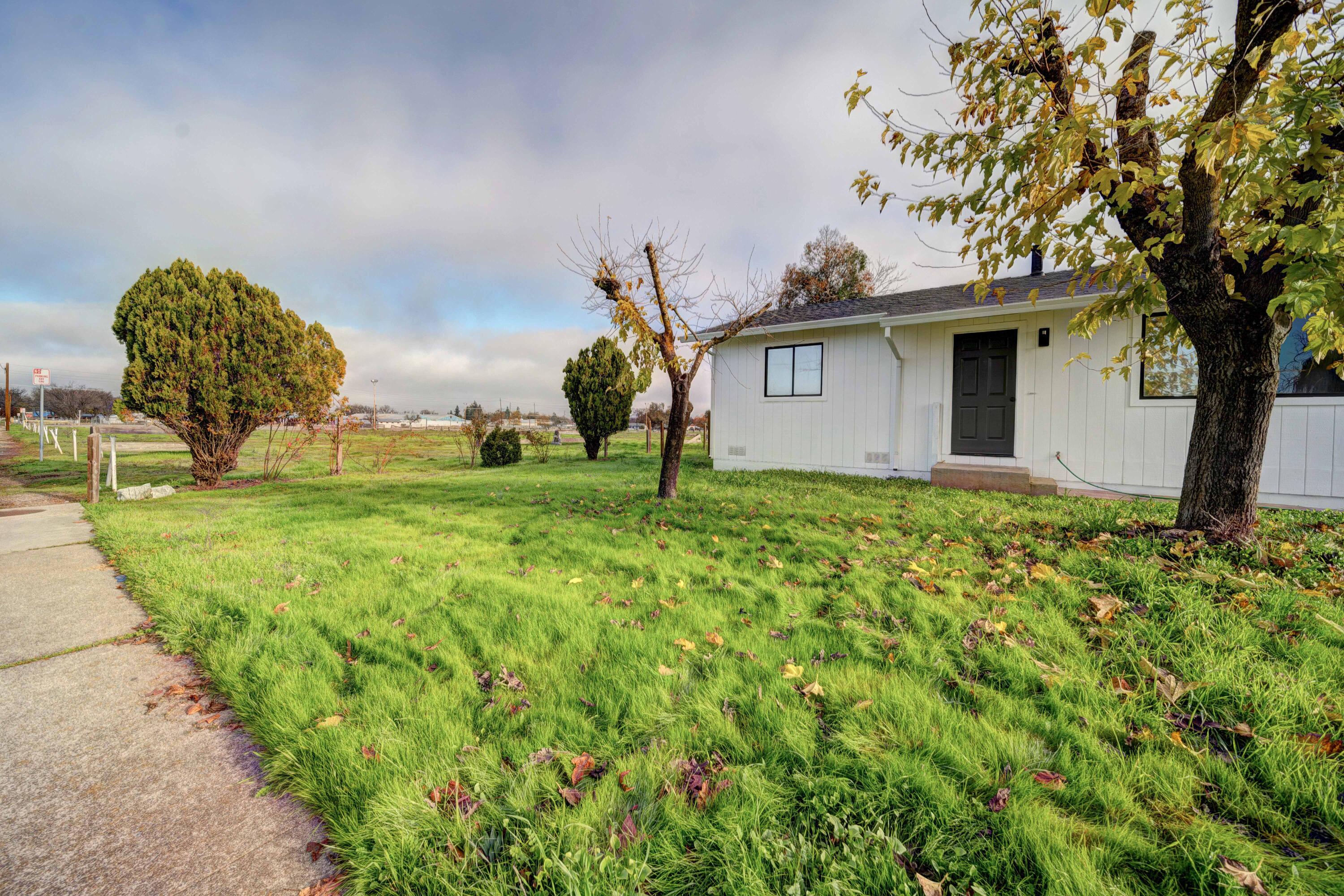 1611 2nd Street Anderson, CA 96007 - Photo 18 of 20 a front view of a house with garden