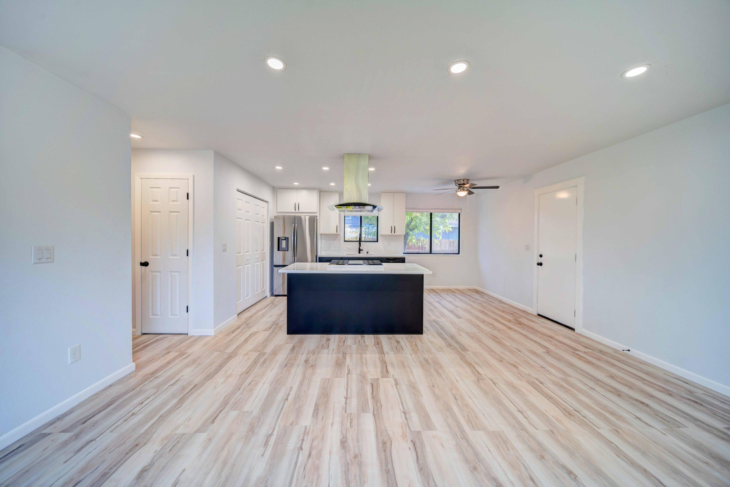 1611 2nd Street Anderson, CA 96007 - Photo 4 of 20 a large room with kitchen view and living room view