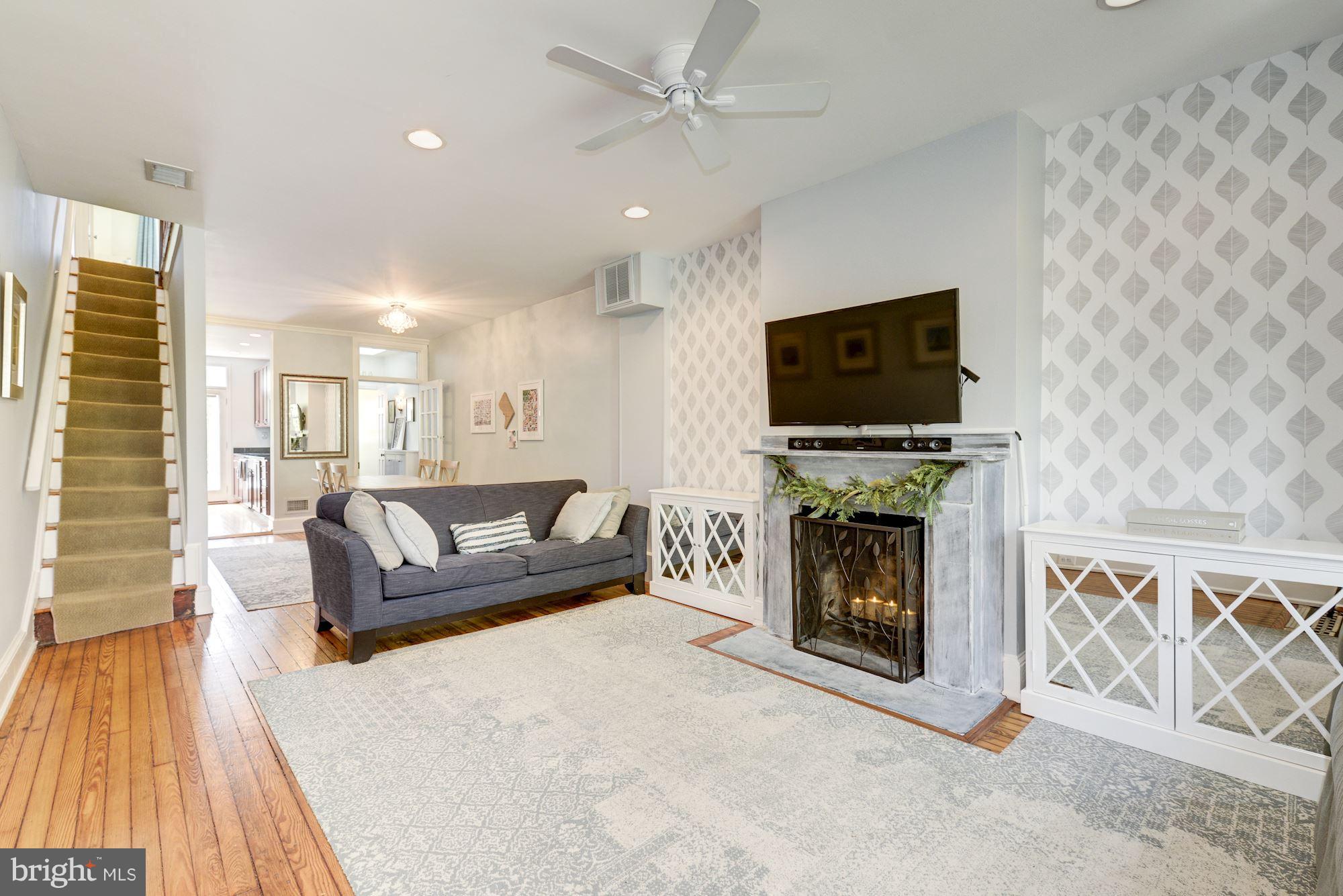 321 D Street Southeast Washington, DC 20003 - Photo 3 of 29 Original wood floors and ample natural light