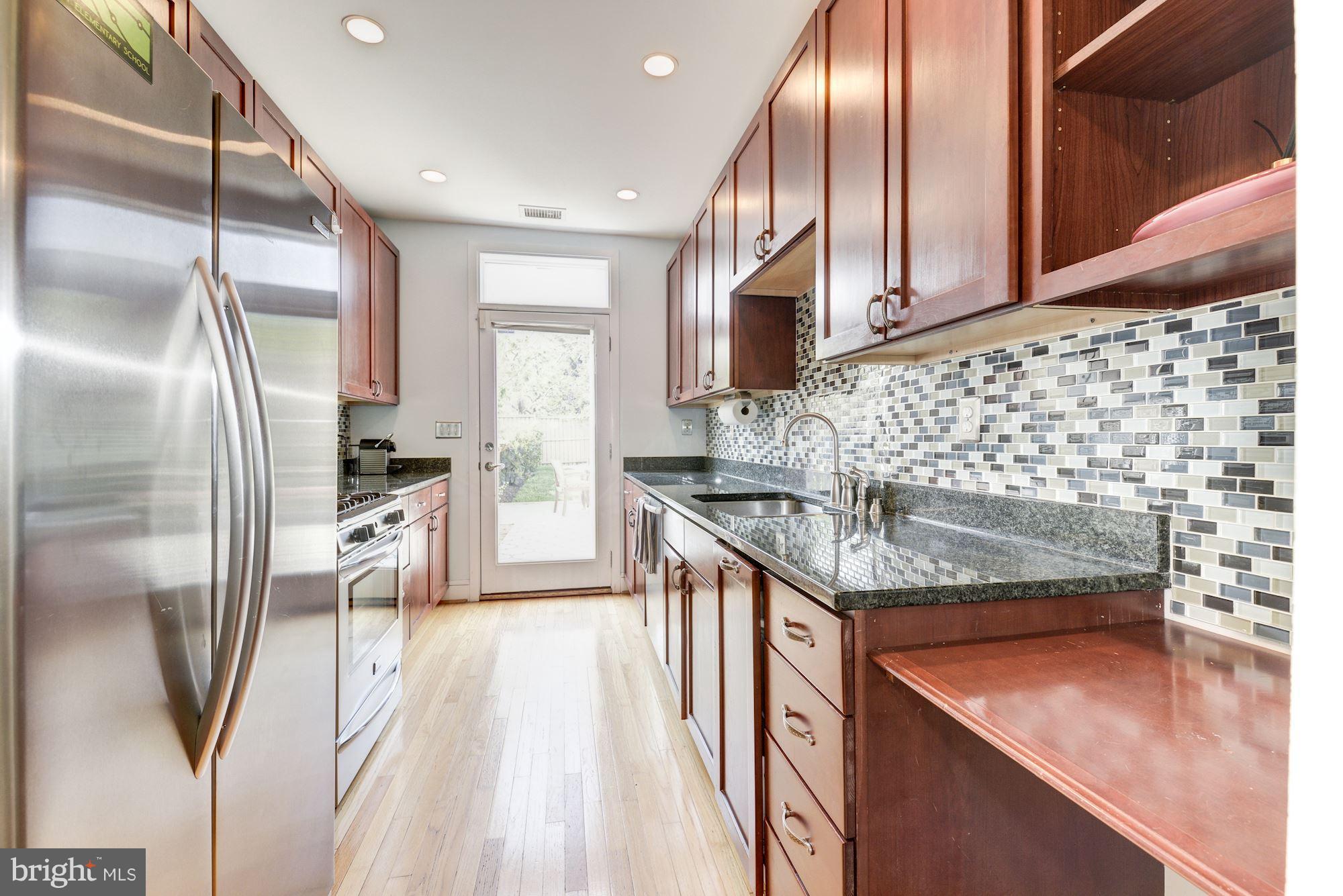 321 D Street Southeast Washington, DC 20003 - Photo 6 of 29 Stainless steel appliances & granite counters