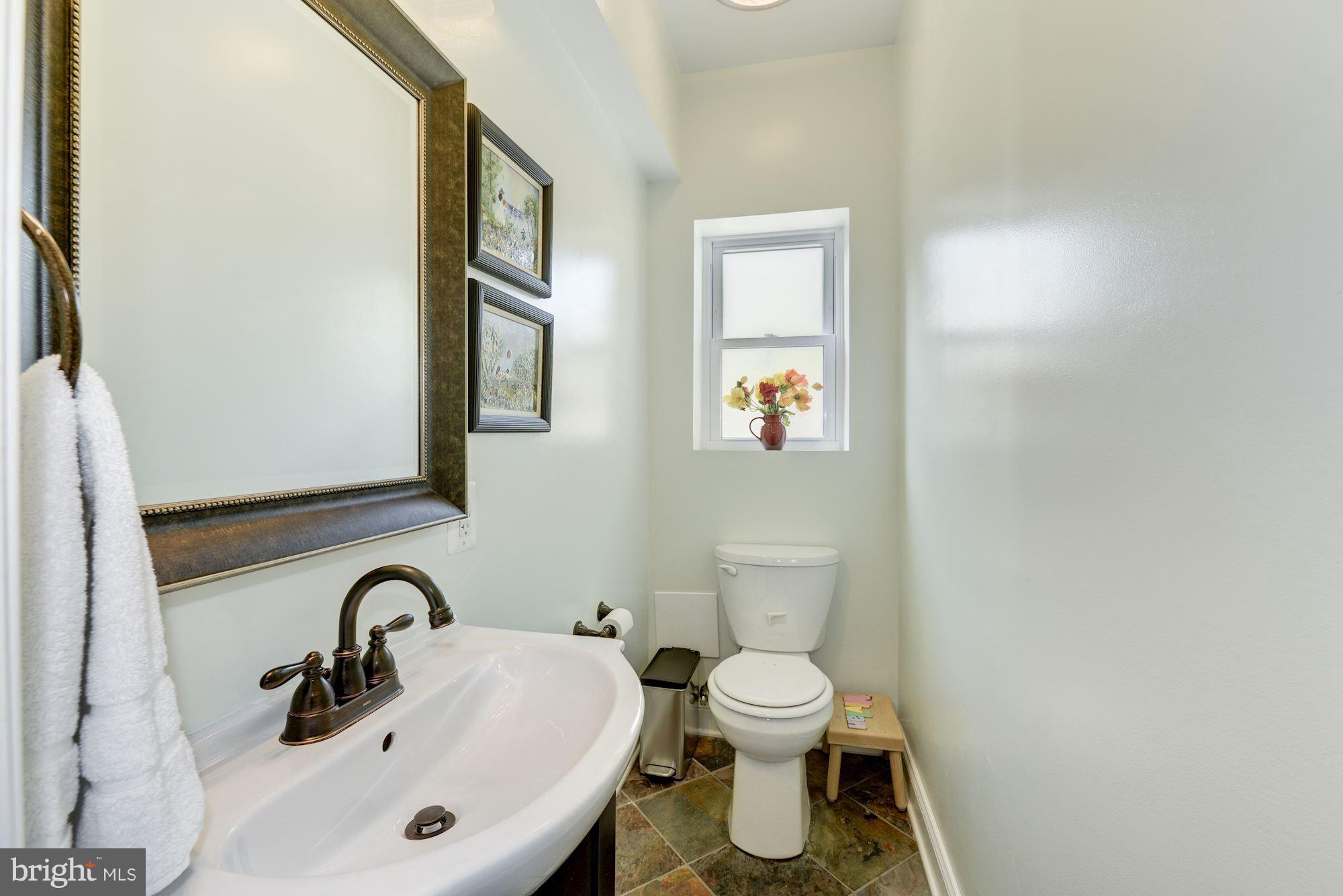 321 D Street Southeast Washington, DC 20003 - Photo 8 of 29 Main level half bath was added by current owners