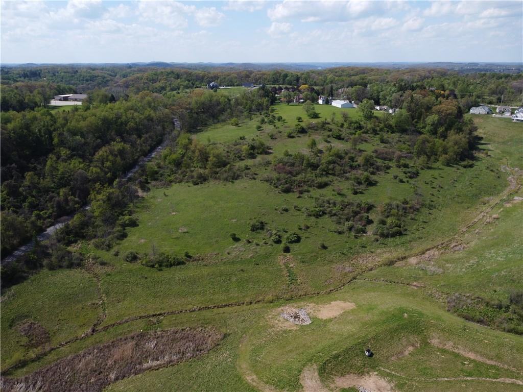 5692 North Montour Road Gibsonia, PA 15044 - Photo 2 of 6 an aerial view of a houses with outdoor space