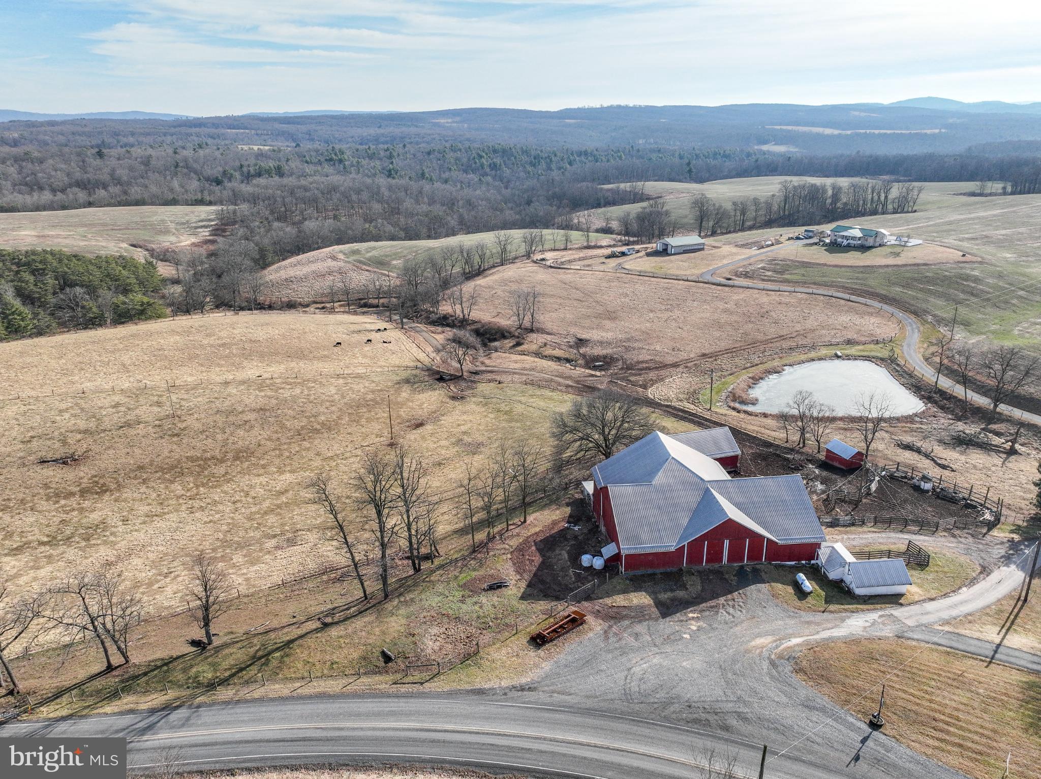7372 Chaneysville Road Clearville, PA 15535 - Photo 126 of 146 Scenic farmland with a vibrant red barn.