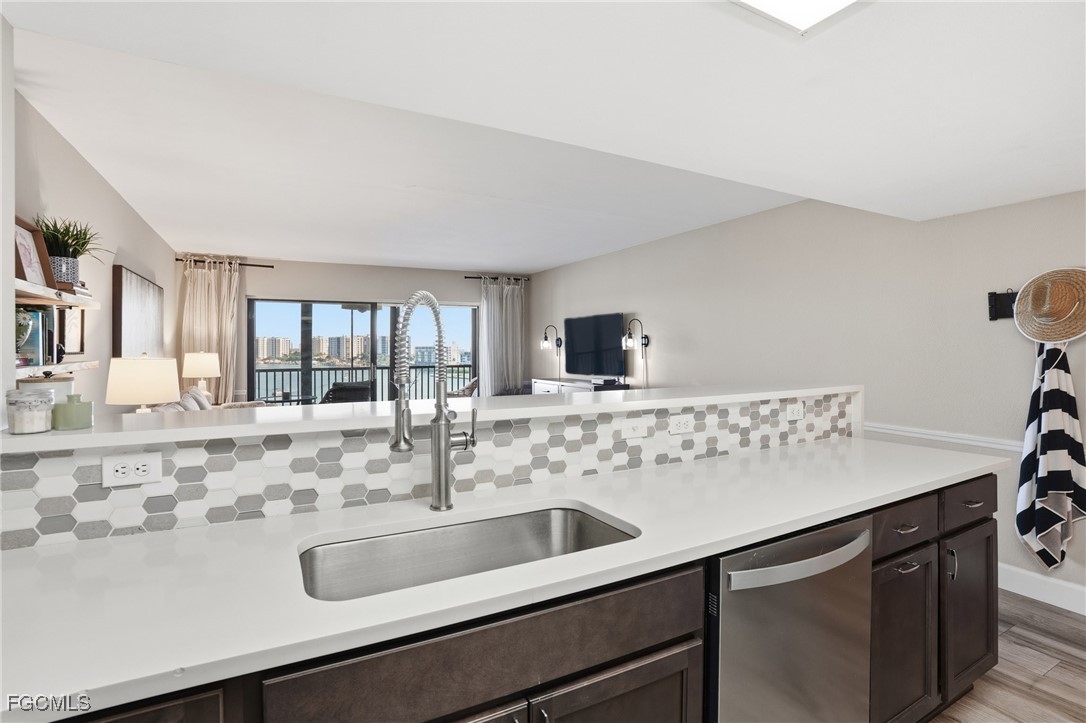 400 Lenell Road, Unit 706 Fort Myers Beach, FL 33931 - Photo 19 of 33 a close view of sink and cabinets