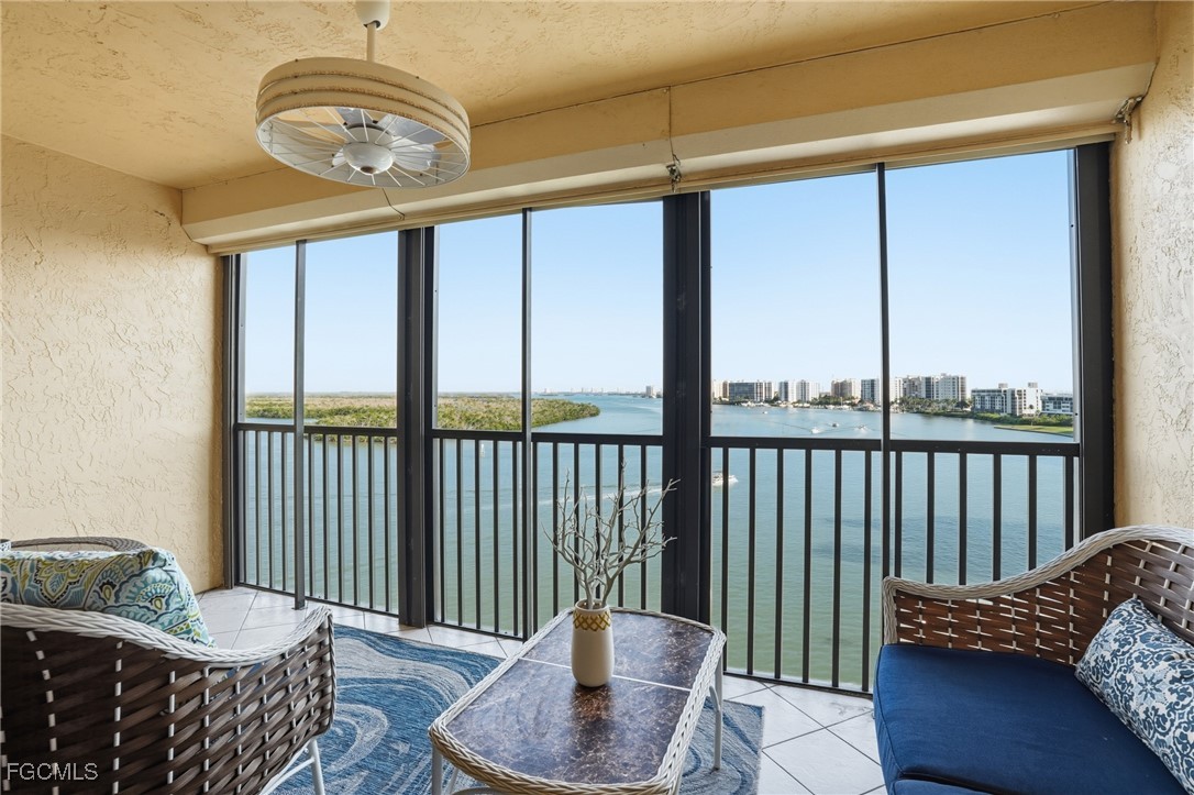 400 Lenell Road, Unit 706 Fort Myers Beach, FL 33931 - Photo 29 of 33 a living room with furniture and a window