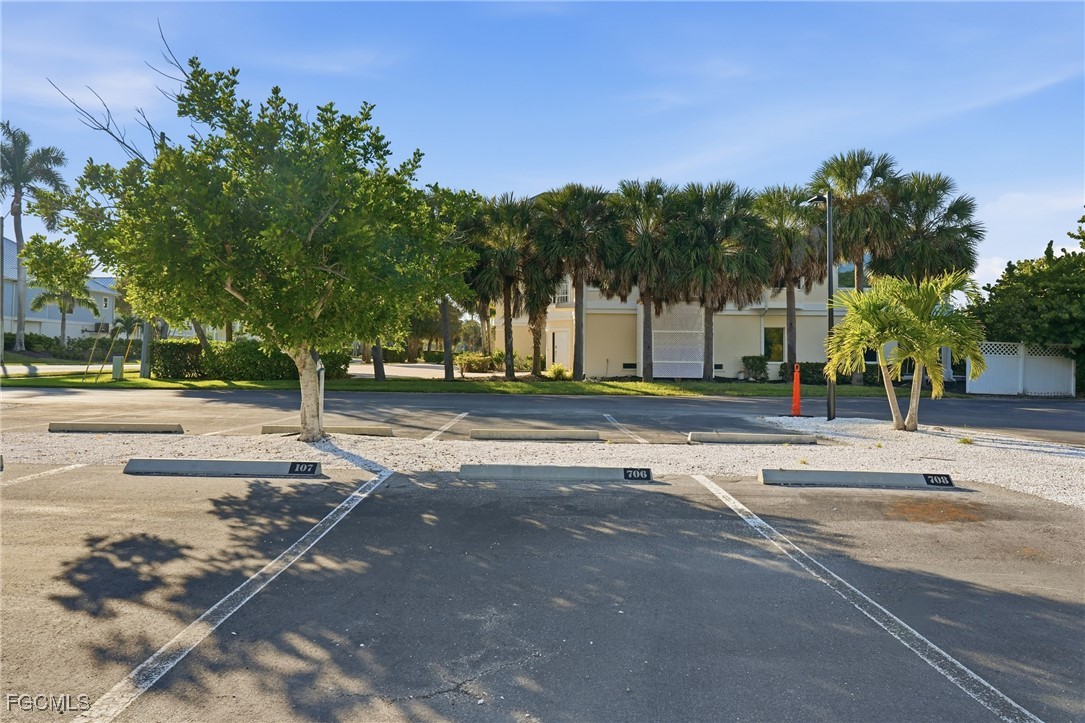 400 Lenell Road, Unit 706 Fort Myers Beach, FL 33931 - Photo 31 of 33 a view of street with palm trees