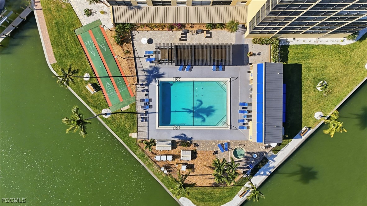 400 Lenell Road, Unit 706 Fort Myers Beach, FL 33931 - Photo 33 of 33 a bed room with a bed chair and a window