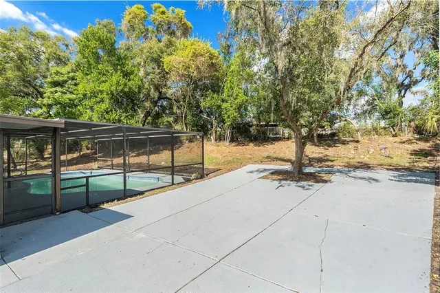 a view of a street with sitting area