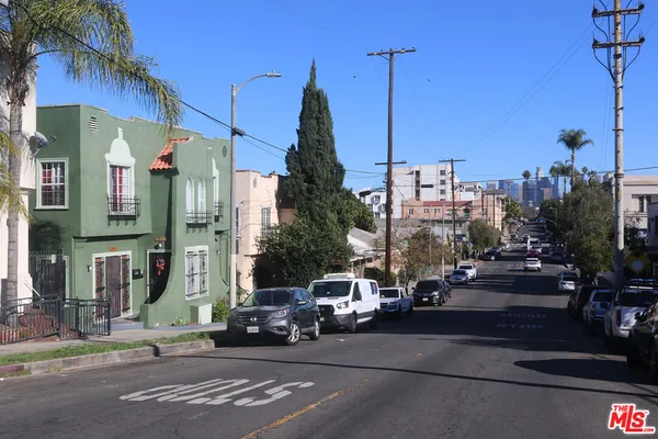 a city street lined with tall buildings