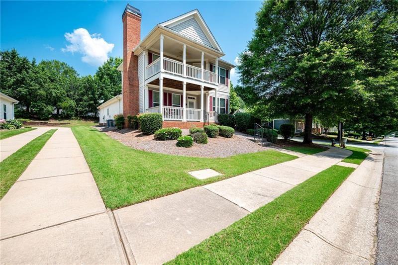 65 Orchard Drive Covington, GA 30014 - Photo 2 of 50 a front view of a house with a yard