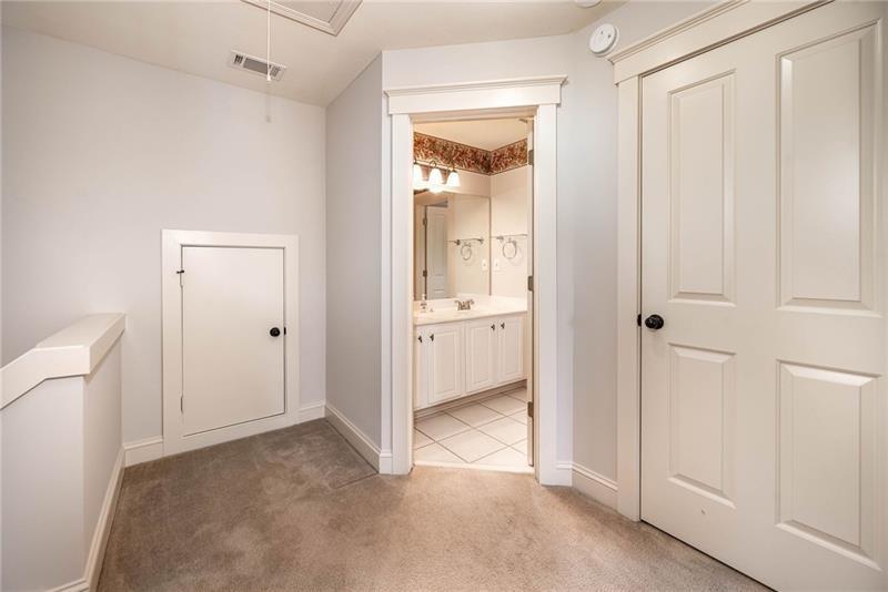 65 Orchard Drive Covington, GA 30014 - Photo 27 of 50 a view of a bathroom with a glass door shower
