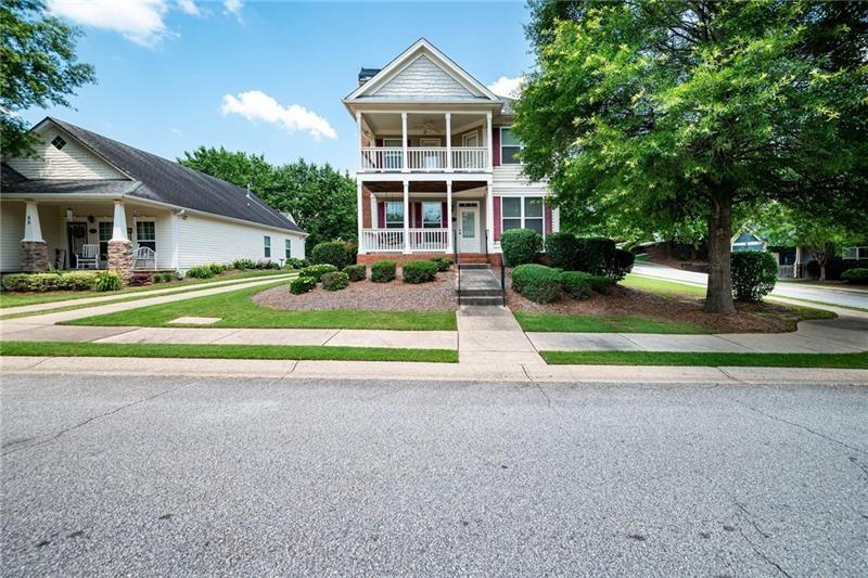 65 Orchard Drive Covington, GA 30014 - Photo 32 of 50 a view of a house with a yard and plants