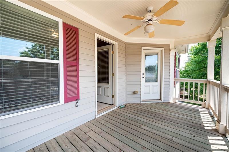 65 Orchard Drive Covington, GA 30014 - Photo 33 of 50 a view of a balcony with a ceiling fan