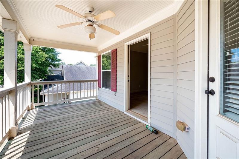 65 Orchard Drive Covington, GA 30014 - Photo 34 of 50 a view of a balcony with wooden floor