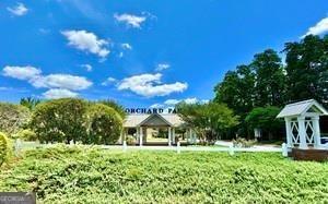 65 Orchard Drive Covington, GA 30014 - Photo 43 of 50 a front view of a house with a yard