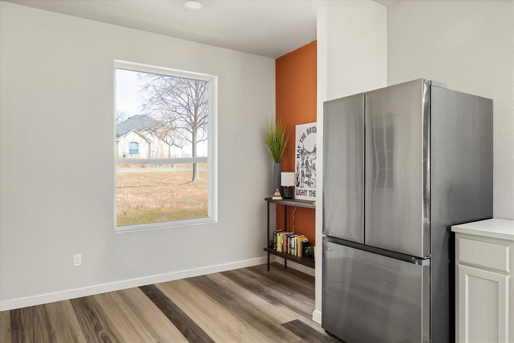 4801 West Wedgefield Road Granbury, TX 76049 - Photo 11 of 40 a view of an empty room with a window