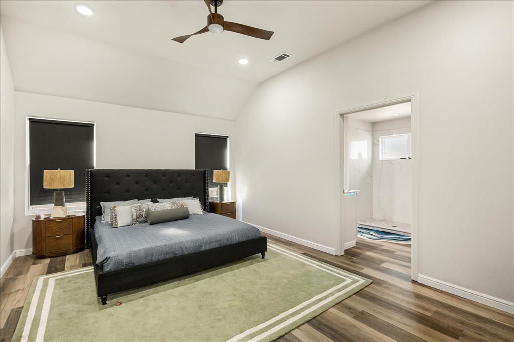 4801 West Wedgefield Road Granbury, TX 76049 - Photo 15 of 40 a bedroom with a bed and a dresser