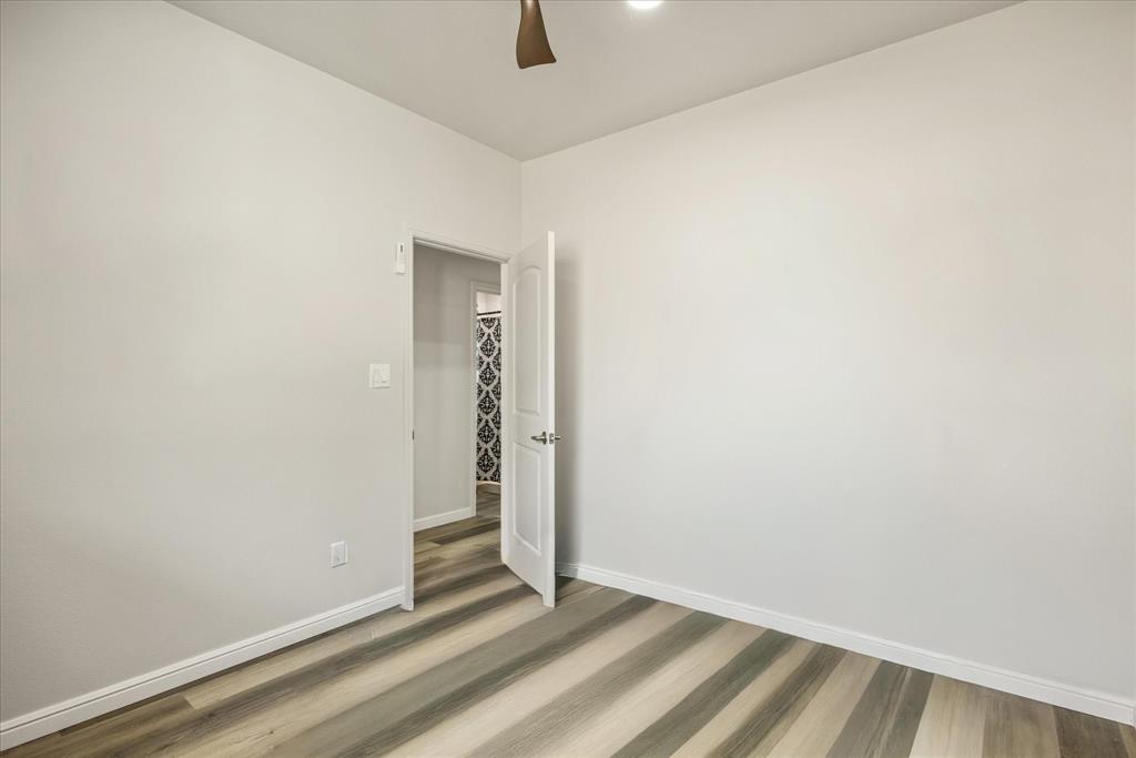 4801 West Wedgefield Road Granbury, TX 76049 - Photo 28 of 40 a view of an empty room