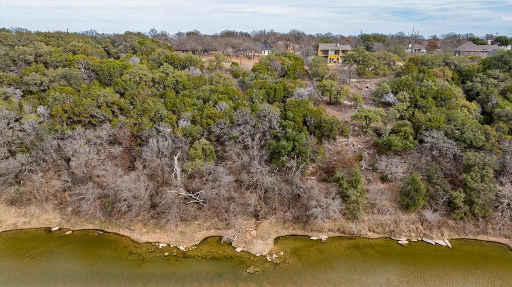 4801 West Wedgefield Road Granbury, TX 76049 - Photo 38 of 40 an aerial view of a houses with a lake view