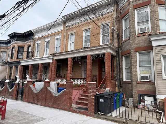 a front view of a brick building