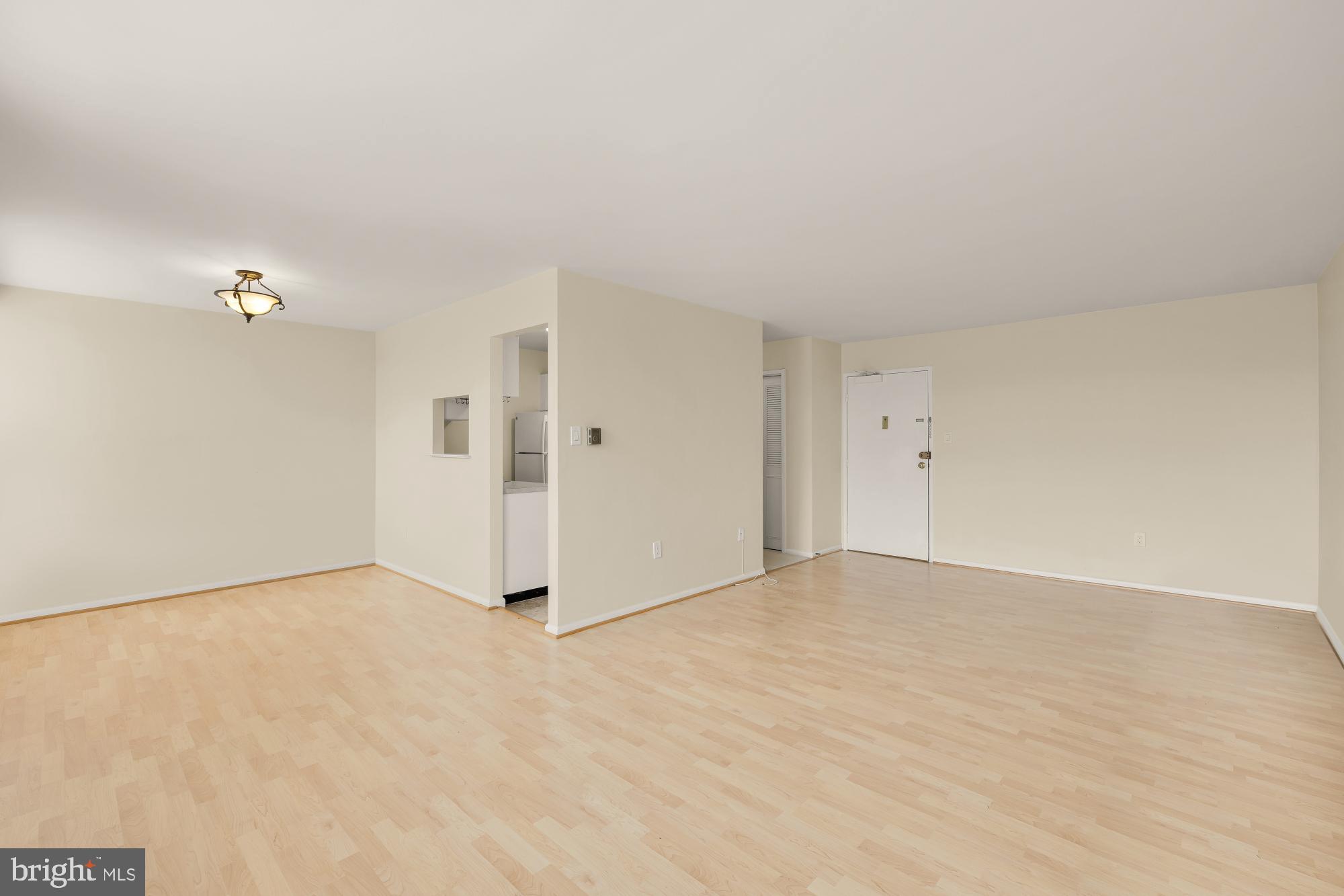 4390 Lorcom Lane, Unit 503 Arlington, VA 22207 - Photo 5 of 31 Spacious, light-filled living area awaits you.