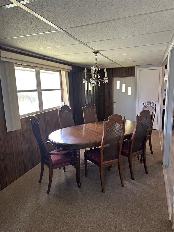 4509 10th St Court East Ellenton, FL 34222 - Photo 12 of 23 a view of a dining room with furniture