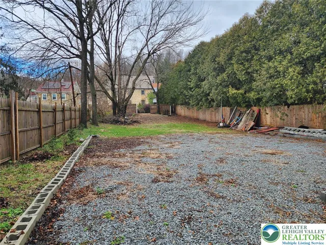 a view of backyard with green space