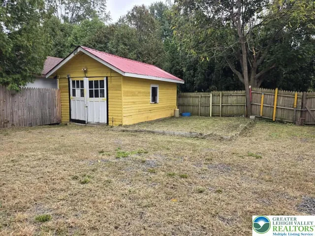a view of backyard of house