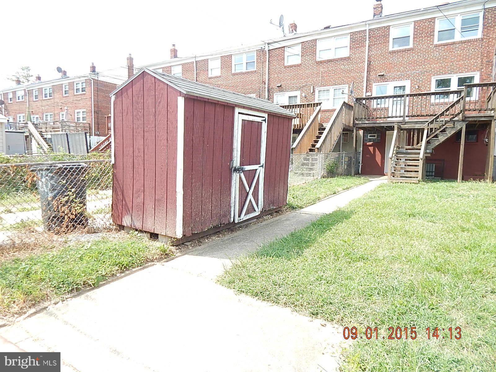 1655 Langford Road Baltimore, MD 21207 - Photo 11 of 12 a view of a house with backyard