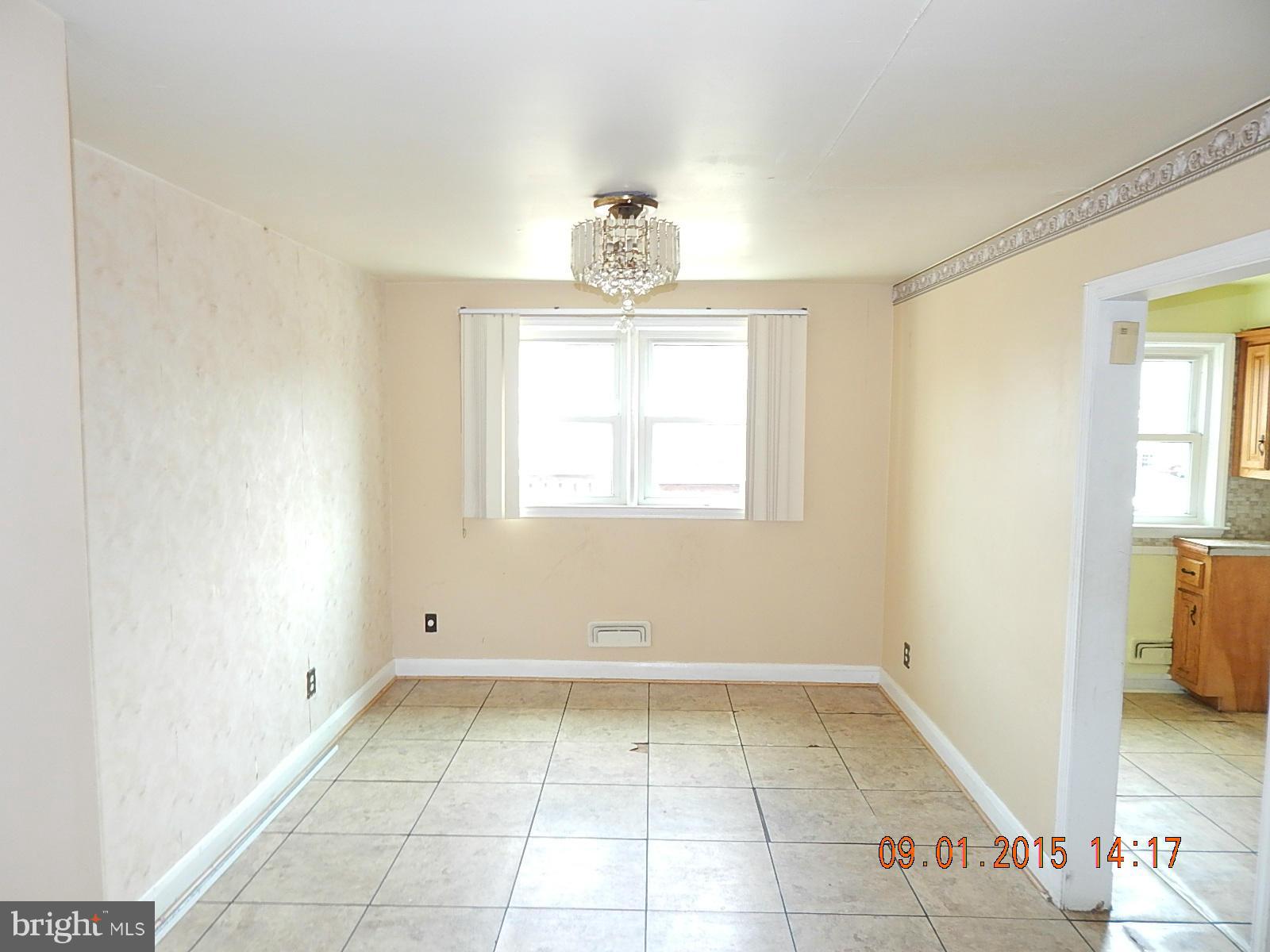 1655 Langford Road Baltimore, MD 21207 - Photo 3 of 12 a view of a room that has a window in it
