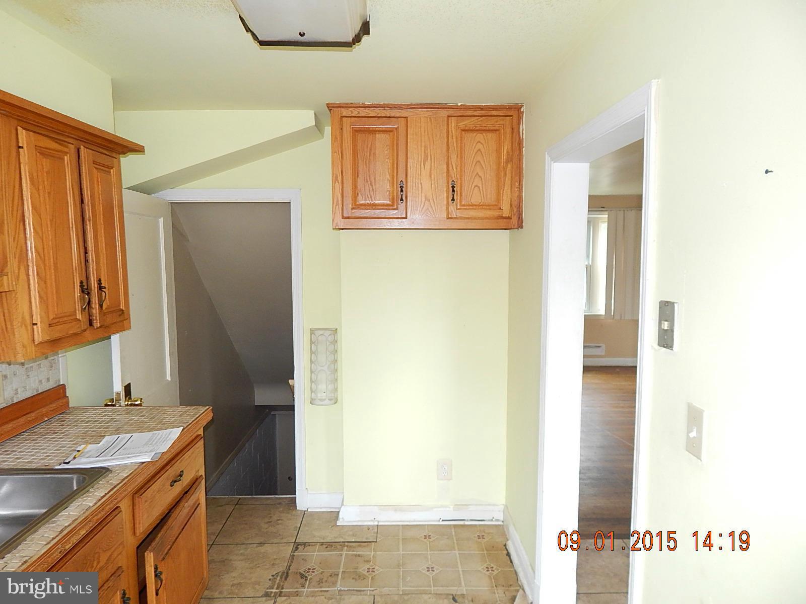 1655 Langford Road Baltimore, MD 21207 - Photo 4 of 12 a bathroom with a sink and a mirror
