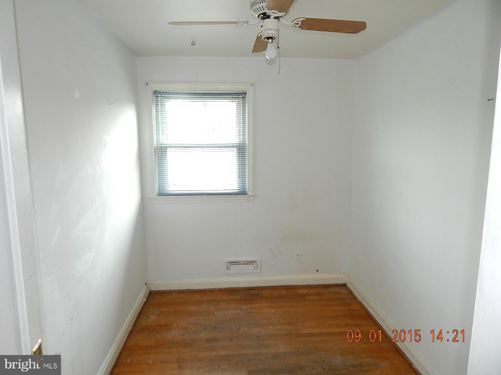 1655 Langford Road Baltimore, MD 21207 - Photo 6 of 12 an empty room with a window