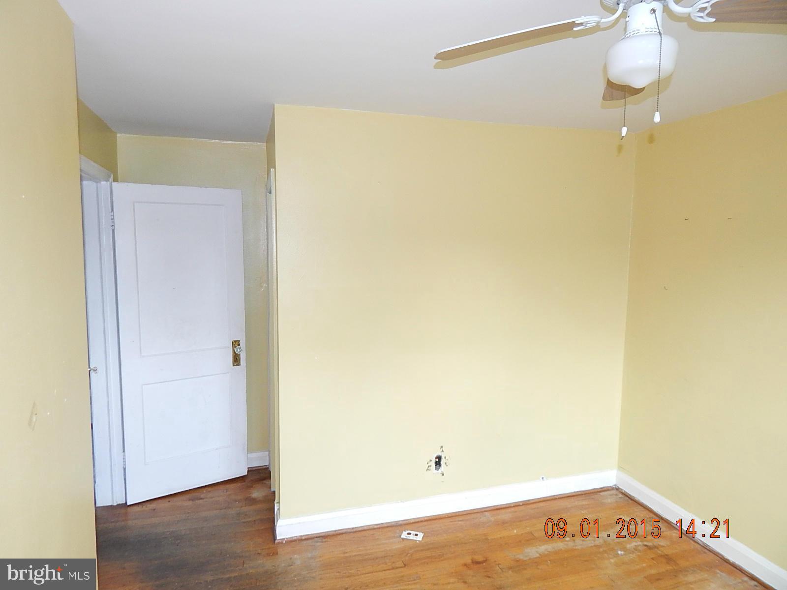 1655 Langford Road Baltimore, MD 21207 - Photo 8 of 12 a view of a room with wooden floor