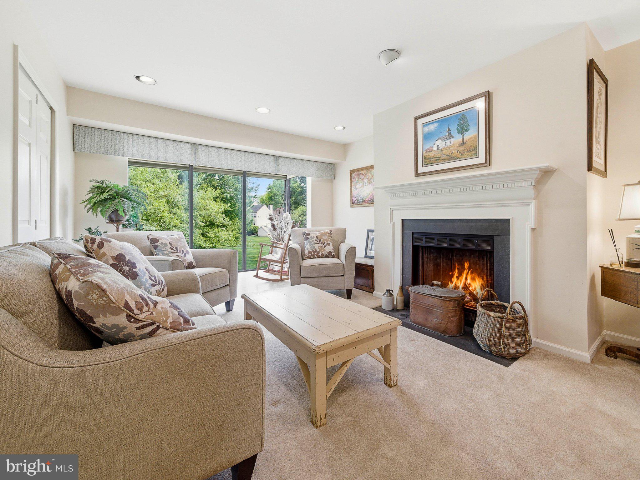 1833 Perrin Court Ambler, PA 19002 - Photo 12 of 58 Cozy living room with a warm fireplace.