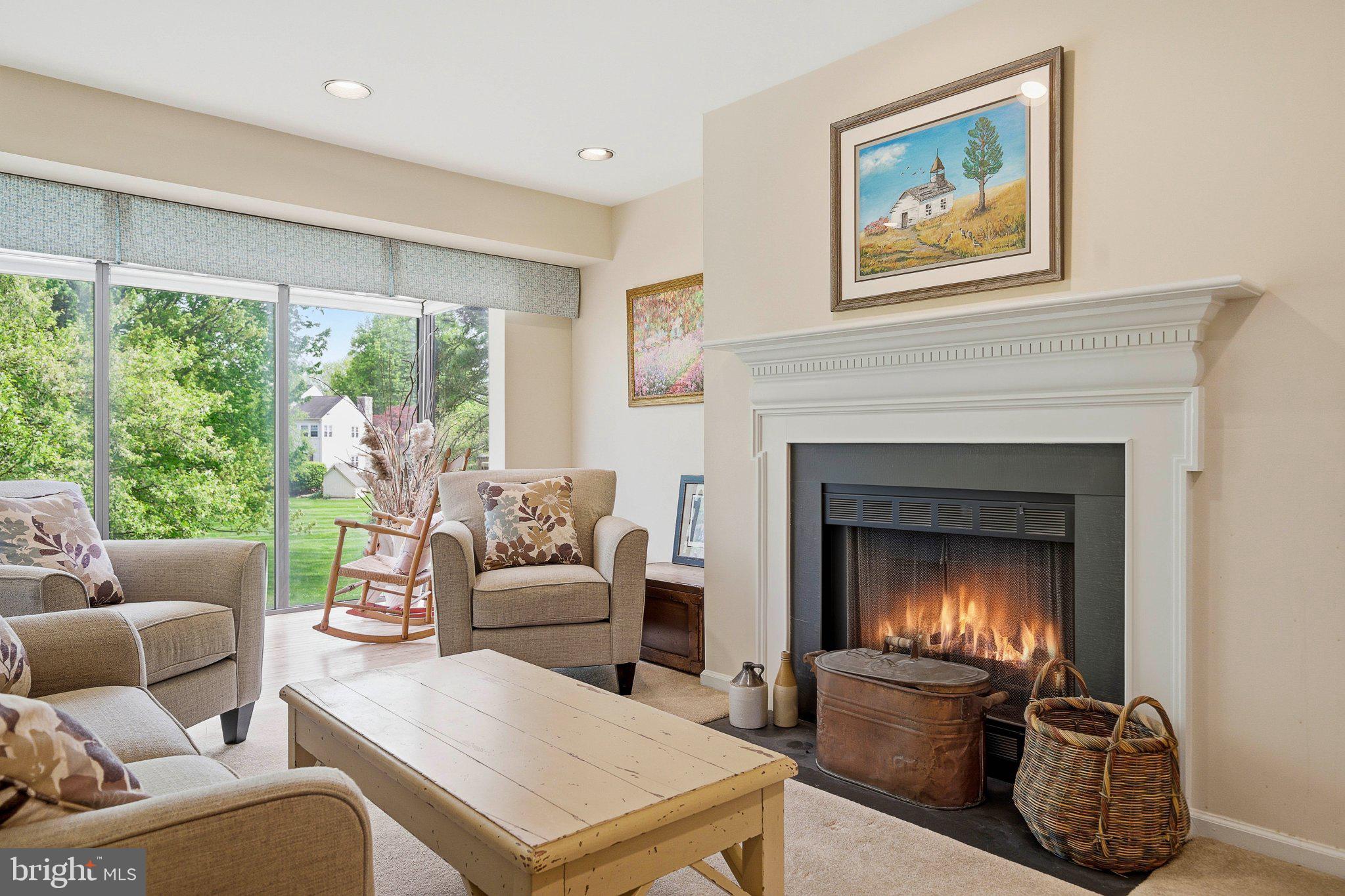 1833 Perrin Court Ambler, PA 19002 - Photo 13 of 58 Cozy living space with a warm fireplace.