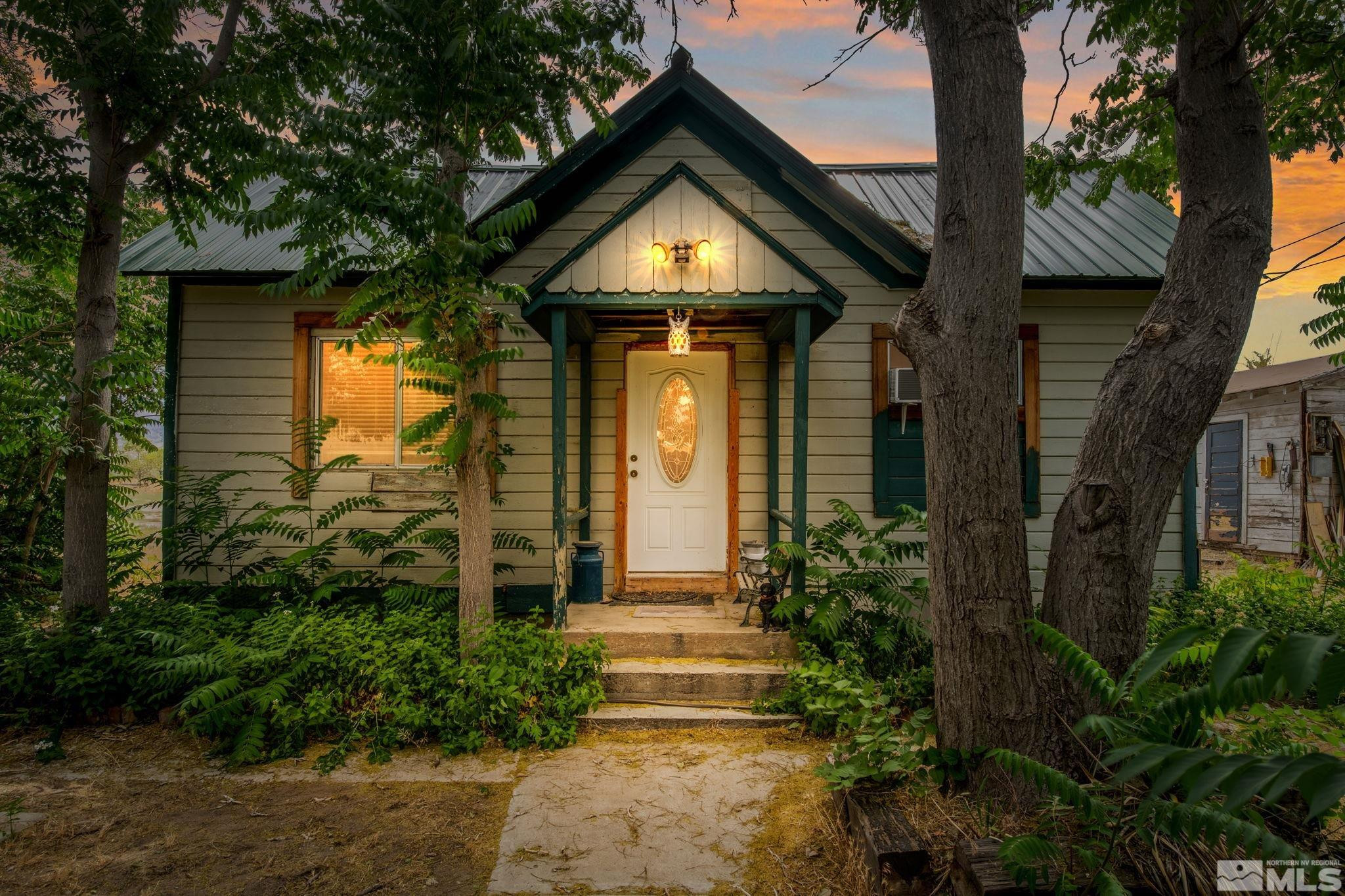 200 Reservation Road Wadsworth, NV 89442 - Photo 1 of 30 a front view of a house with garden