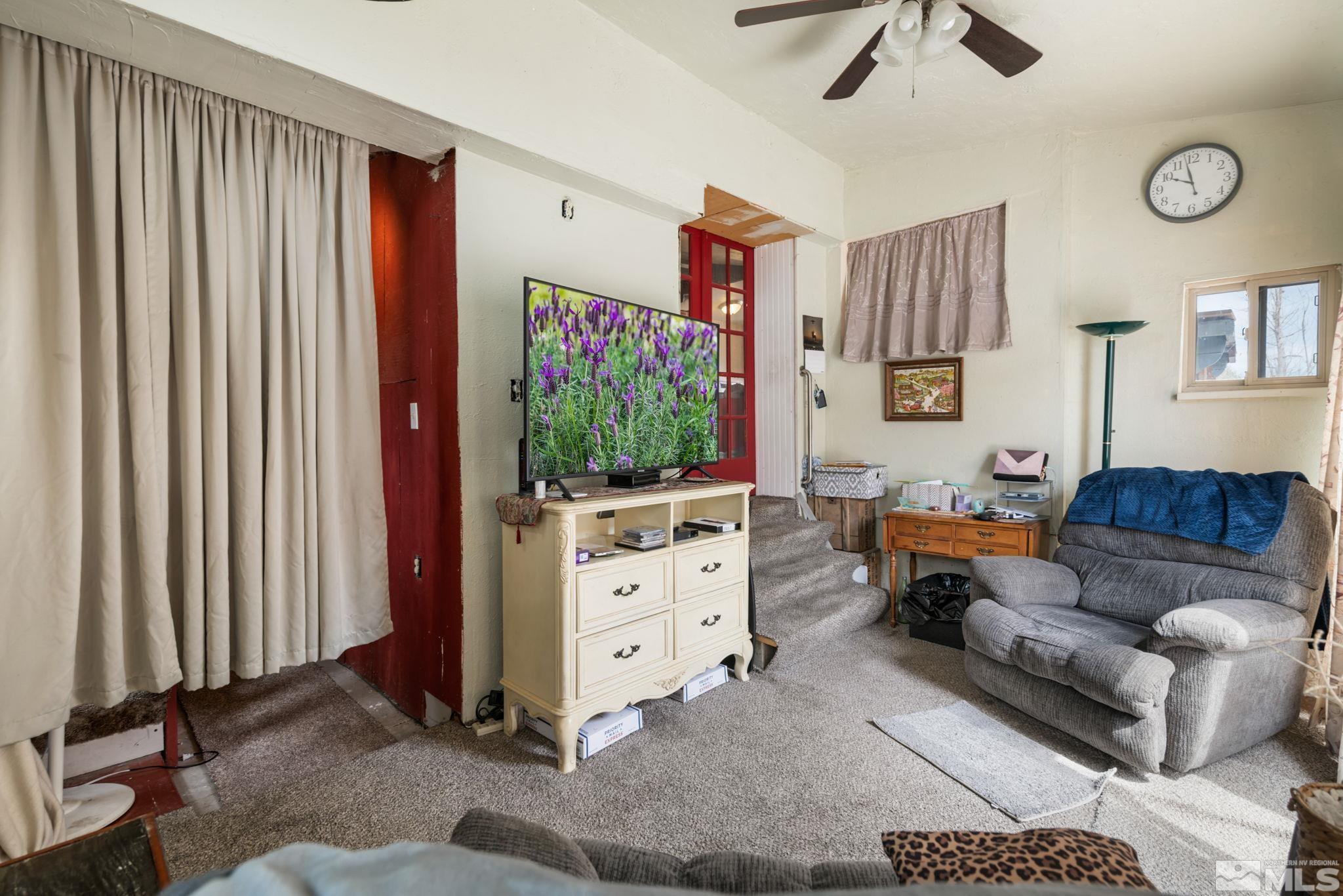 200 Reservation Road Wadsworth, NV 89442 - Photo 12 of 30 a living room with furniture and a window