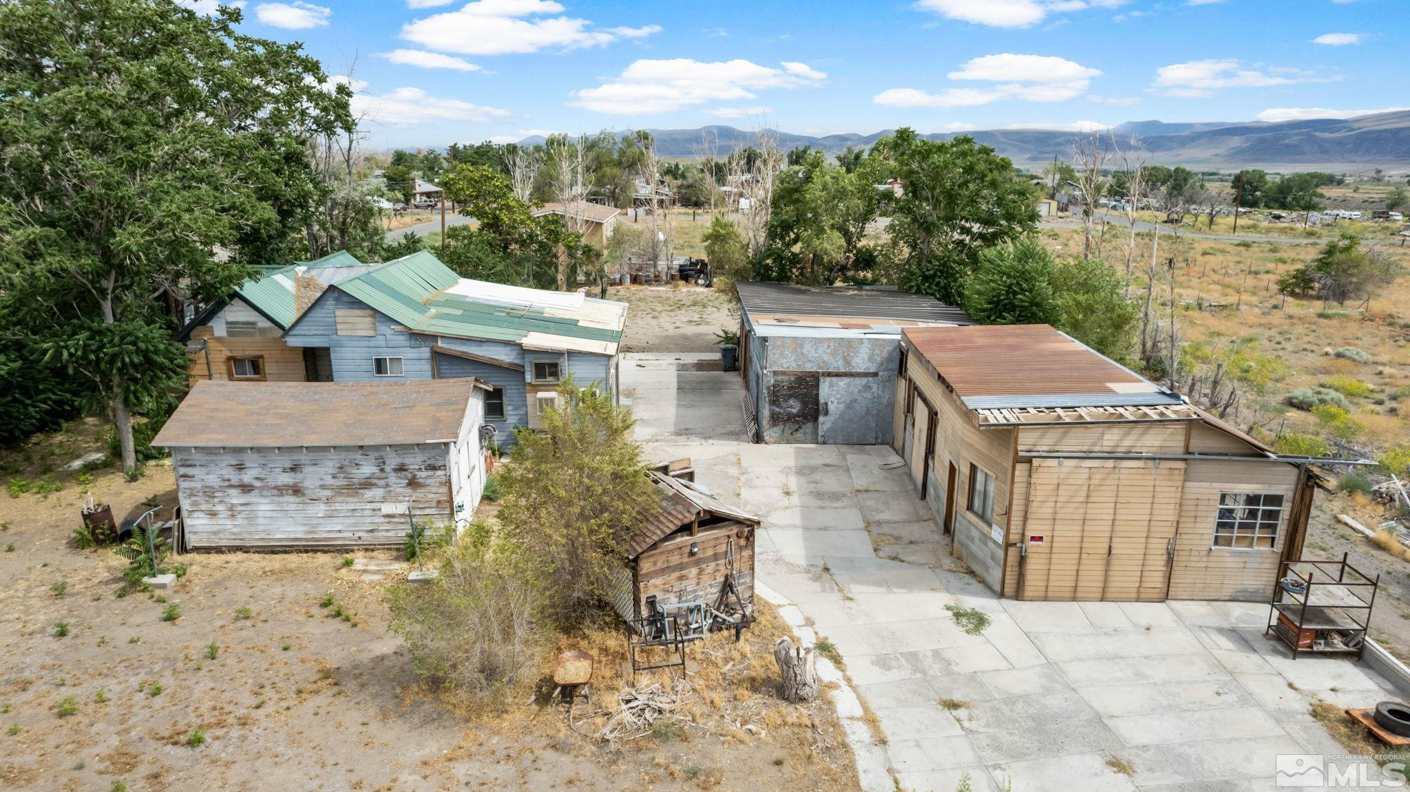 200 Reservation Road Wadsworth, NV 89442 - Photo 17 of 30 a view of a terrace with a garden and covered with tall trees