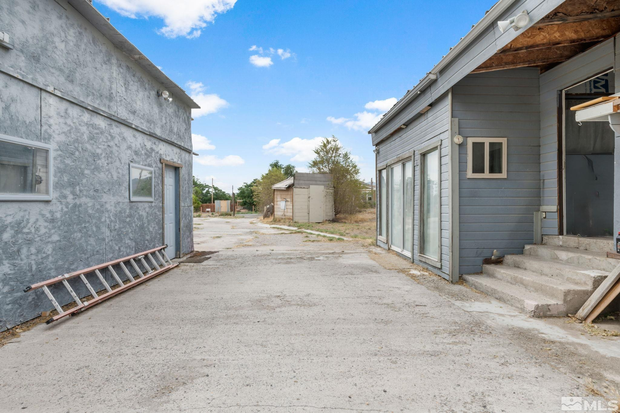 200 Reservation Road Wadsworth, NV 89442 - Photo 19 of 30 a view of a house with a wooden fence