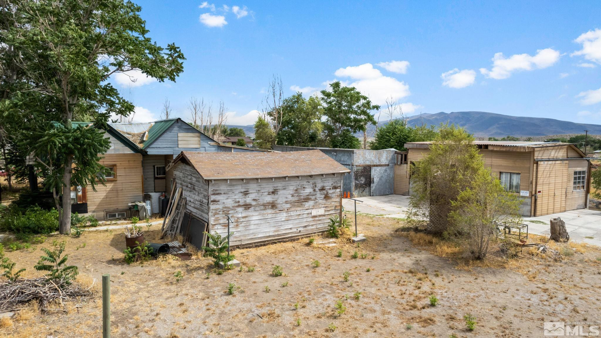 200 Reservation Road Wadsworth, NV 89442 - Photo 22 of 30 a view of a house with a yard and covered with snow