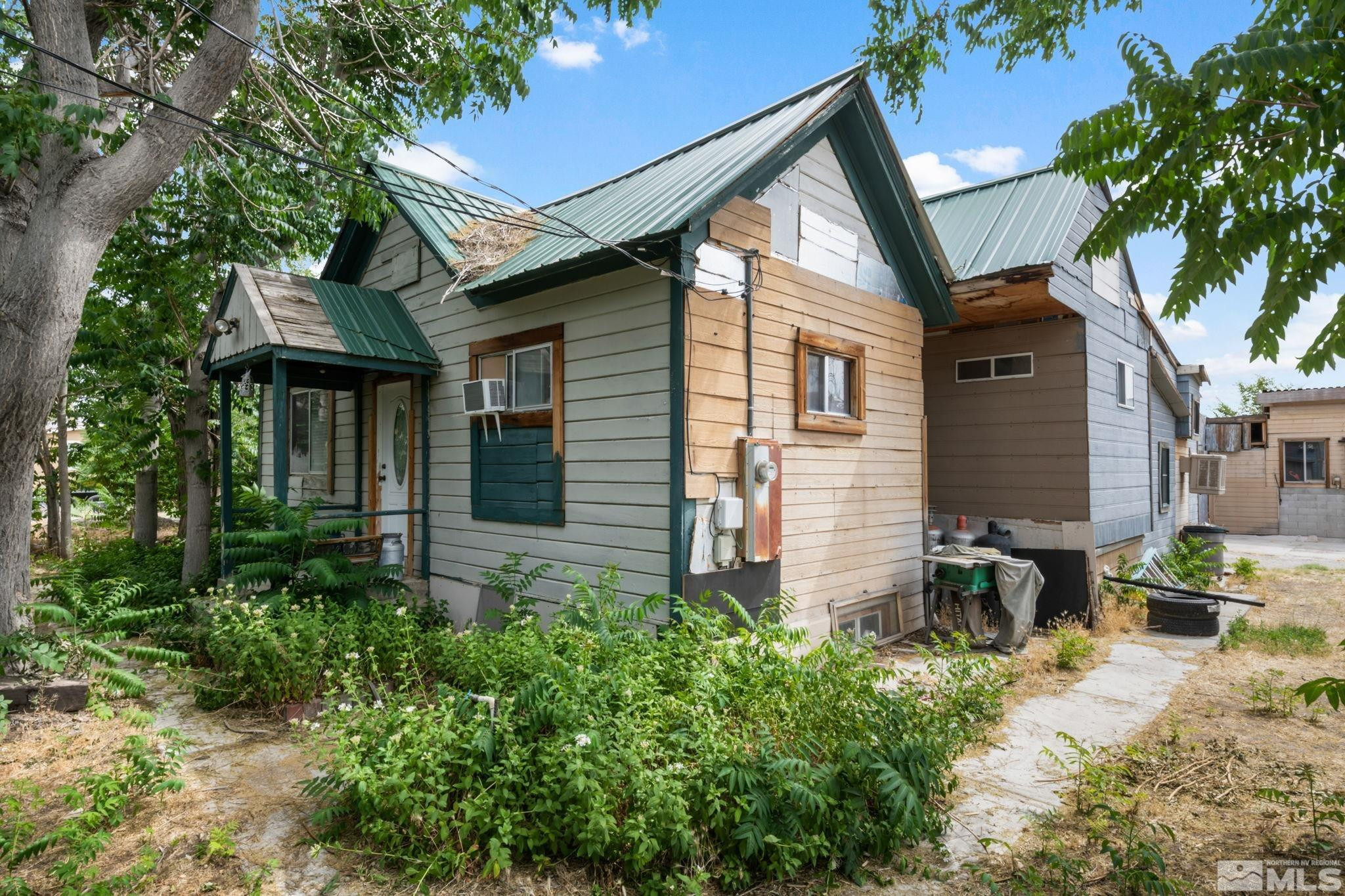 200 Reservation Road Wadsworth, NV 89442 - Photo 4 of 30 a front view of a house with garden