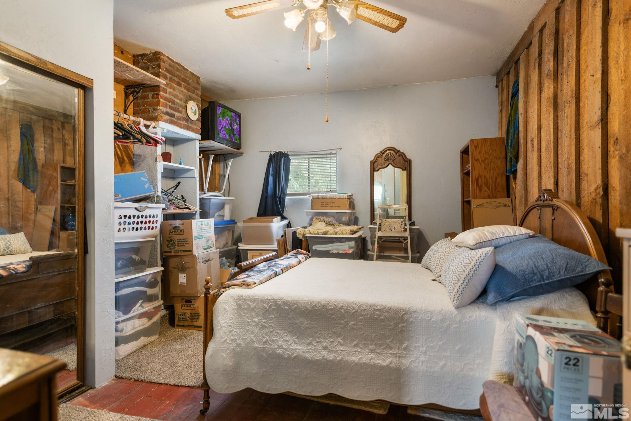 200 Reservation Road Wadsworth, NV 89442 - Photo 8 of 30 a bedroom with double bed and a window