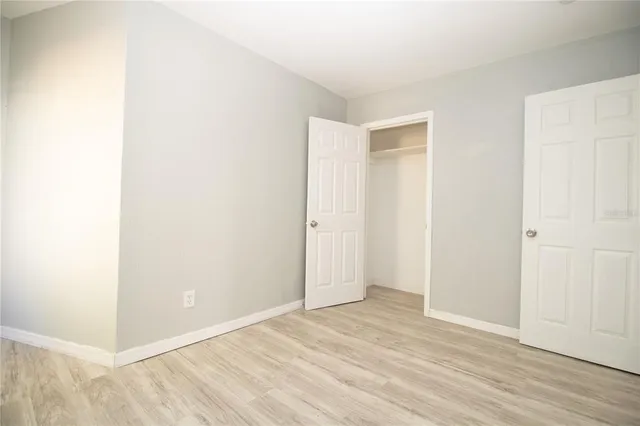 a view of a room that has a window in it