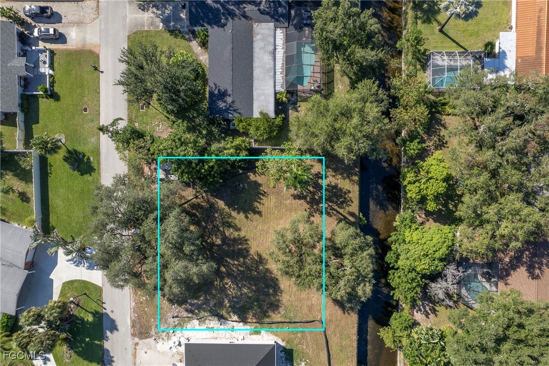 1329 Carlene Avenue Fort Myers, FL 33901 - Photo 6 of 10 an aerial view of residential house with outdoor space and trees around