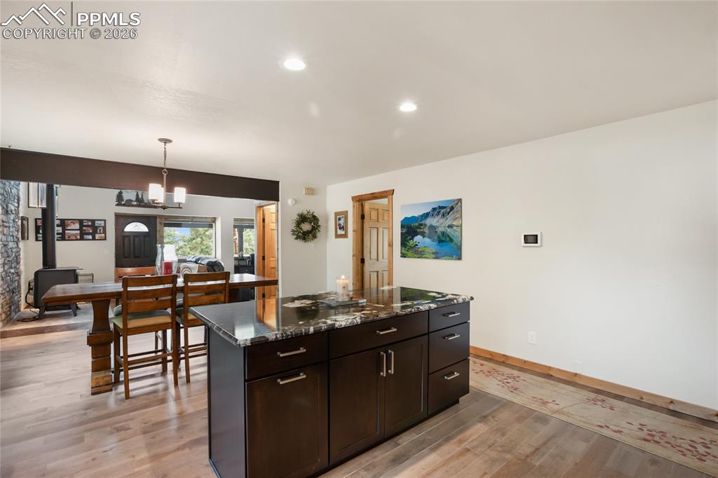 45 Barr Lake Circle Divide, CO 80814 - Photo 13 of 40 a room with granite countertop lots of wooden furniture